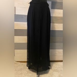 Black, palazzo pants. Size 12P by JR Nites.